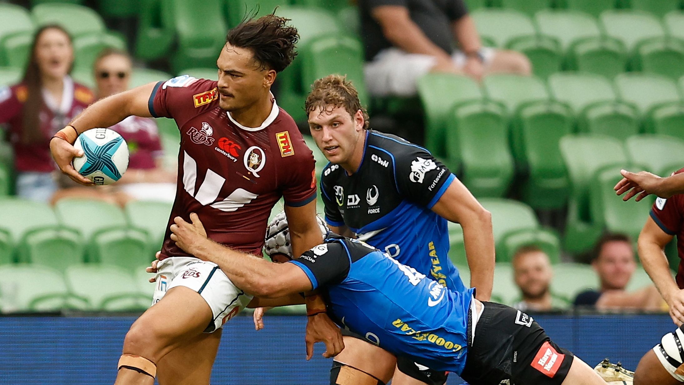 Jordan Petaia is tackled by a Western Force player.