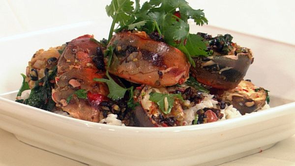 Stir-fry cray tails in salty black beans