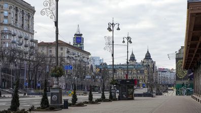 An empty street is seen due to curfew in the central of Kyiv, Ukraine, Sunday, Feb. 27, 2022.