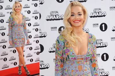 The winner of the hottest red carpet look at Radio 1's 2014 Teen Awards is...Rita Ora!<br/><br/>Appearing to present the show alongside Nick Grimshaw, Rita, 23, struggled to keep her cleavage under control in this eye-popping floral mini.<br/><br/>Scroll through to see who else rocked up to London's Wembley Arena for the industry event in our slideshow...<br/>