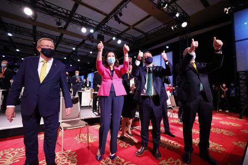 TOKYO, JAPAN - JULY 21:  Members of the Brisbane 2032 delegation (L-R) John Coates AC, President, Australian Olympic Committee,  The Honourable Annastacia Palaszczuk MP, Premier of Queensland and Minister for Trade, The Right Honourable the Lord Mayor of Brisbane, Councillor Adrian Schrinner, and Senator the Honourable Richard Colbeck, Minister for Senior Australians and Aged Care Services and Minister for Sport celebrate after Brisbane was announced as the 2032 Summer Olympics host city during 