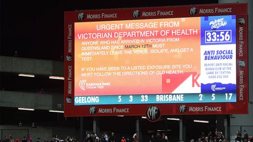 The Victorian government's latest guideline shown on the big screen at GMHBA Stadium
