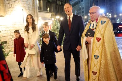 LONDON, ENGLAND - DECEMBER 08: Princess Charlotte of Wales, Catherine, Princess of Wales, Prince Louis of Wales, Prince George of Wales, Prince William, Prince of Wales and The Dean of Westminster Abbey, The Very Reverend Dr David Hoyle attend The "Together At Christmas" Carol Service at Westminster Abbey on December 08, 2023 in London, England. Spearheaded by The Princess of Wales, and supported by The Royal Foundation, the service is a moment to bring people together at Christmas time and reco