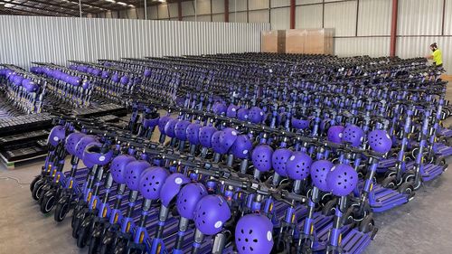 E-scooters in a warehouse ready to be rolled out to some Sydney suburbs.