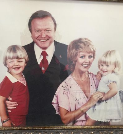 Bert Newton and Patti Newton pose with their two children.