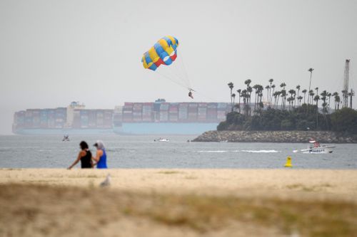 Container ships line up and wait for a berth outside the Port of Long Beach, in the US.