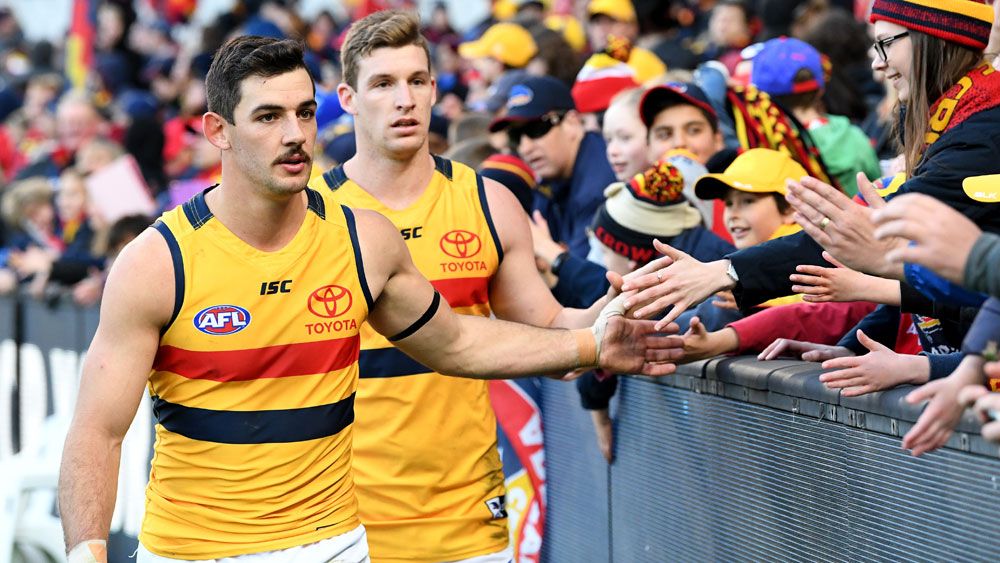 Adelaide down dogged Carlton in AFL