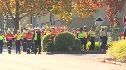 More than 100 workers were evacuated from the site. (9NEWS)