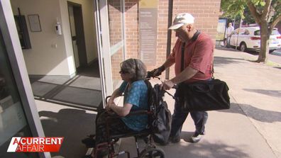 Phillip Hanslow (right) walking into court.