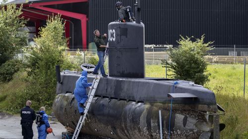 Police investigate Peter Madsen's submarine. (AP)