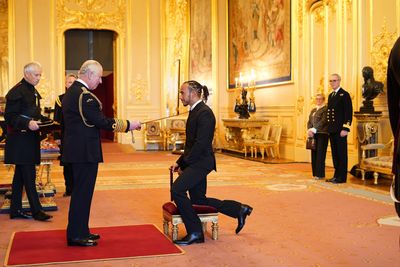 Lewis Hamilton knighted by Prince Charles, December