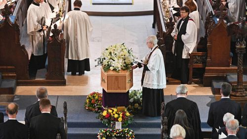 People attend during the funeral of Stephen Hawking at the University Church of St Mary the Great. (EPA)