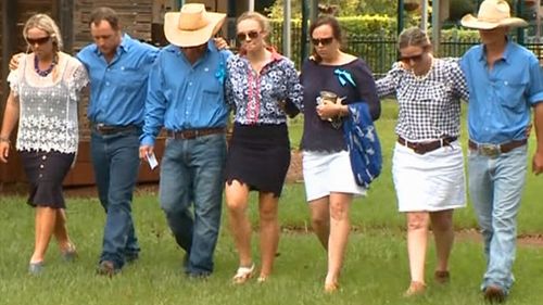 Dolly's friends and family, including dad Tick, her mum Kate and sister Meg. (9NEWS)