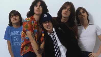 LONDON, UNITED KINGDOM - AUGUST 01: (left to right) Malcolm Young, Bon Scott, Angus Young, Cliff Williams and Phil Rudd of Australian rock band AC/DC pose in London, England in August 1979. (Photo by Fin Costello/Redferns)