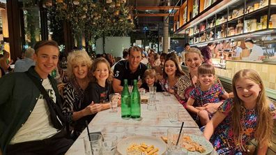 Patti Newton with daughter Lauren, her husband Matt Walsh and their six children.
