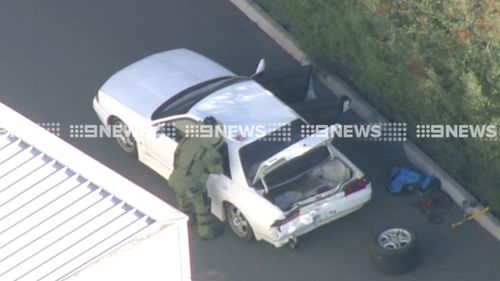 A man has been arrested following a bomb scare at a Melbourne police station.