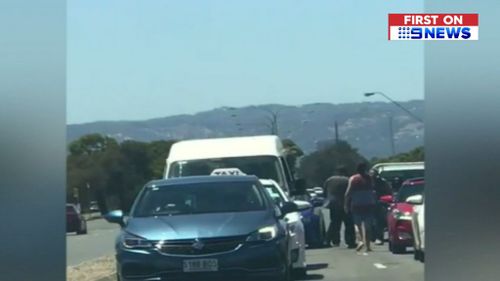 Video of the latest road rage incident shows a man lashing out at other drivers in Adelaide's west. (9NEWS)