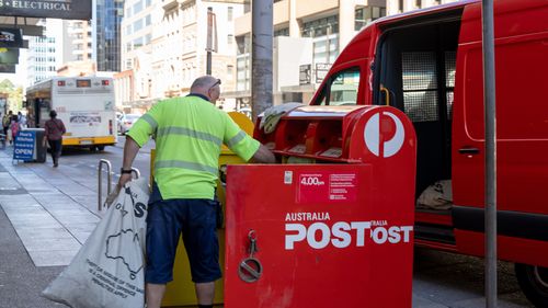 Australia Post has blamed a system error for producing 'non-compliant' stamps for some customers.