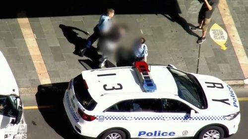 A 13-year-old is taken into custody by police after attempting to flee on a bus after a spot of shopping.