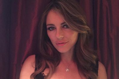 Liz Hurley wears Versace dress