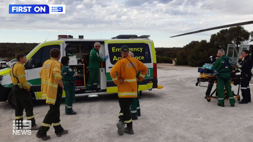 The fire officer was medevaced out of the bushland around 5pm.