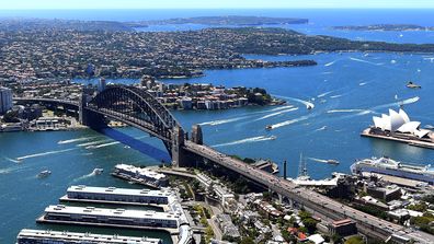 An aerial image shows North Sydney, Sydney Harbour Bridge and the Sydney Opera House.