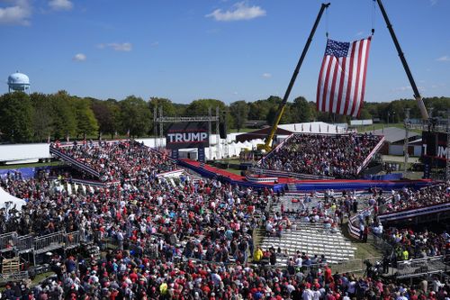 Supporters arrive before Republican presidential nominee former President Donald Trump speaks at Butler