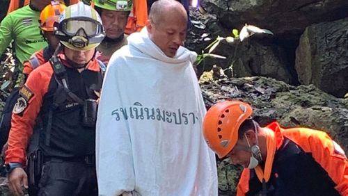 A team of 17 divers managed to reach the monk.