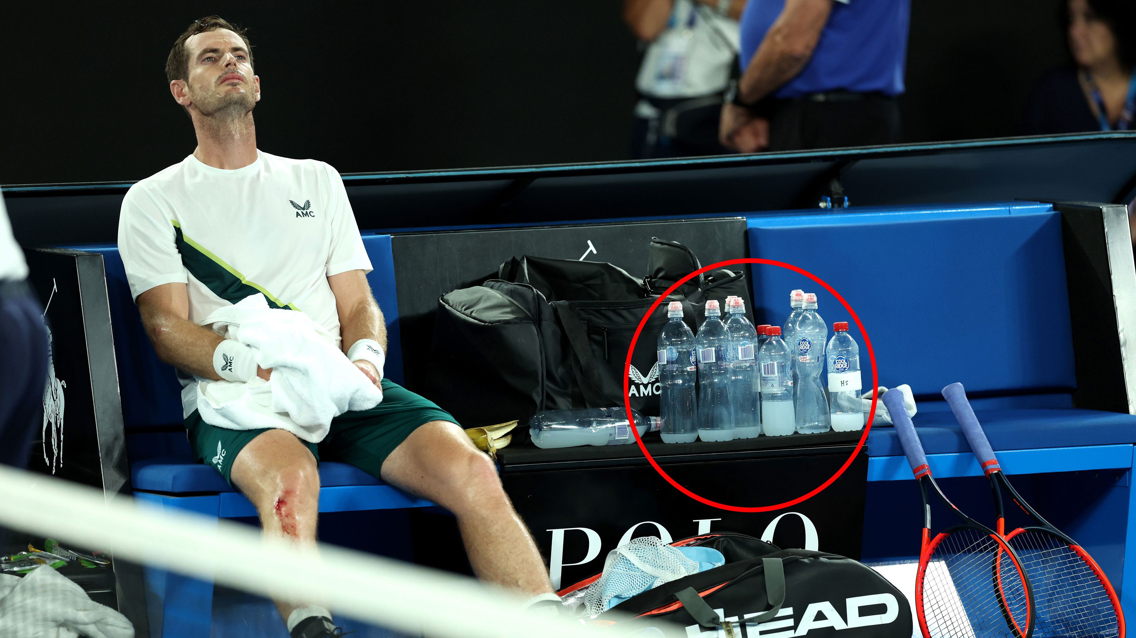 Andy Murray absorbs his win over Matteo Berrettini before collecting his rubbish, which had accumulated over five sets.