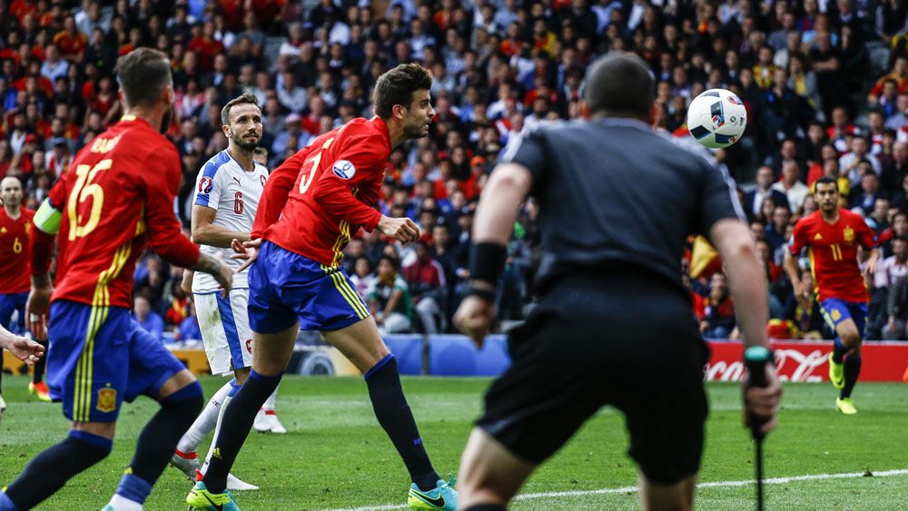 Spain relieved after sealing late win