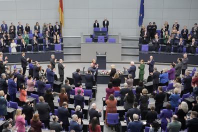 King Charles III, center, is applauded after addressing the Bundestag, Germany's Parliament, in Berlin, Thursday, March 30, 2023. 
