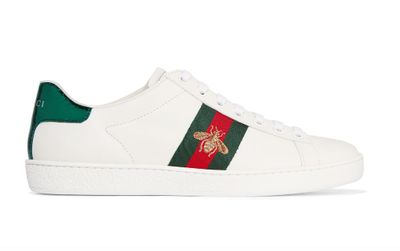 It’s
all in the details. These luxe leather low-tops feature a textured metallic
snake-print heel patch and an embroidered gold bee, Gucci designer Alessandro
Michele's style signature. They’ll command attention dashing between meetings, and work
back with off-duty wear.<br>
Gucci
watersnake-trimmed leather sneakers, $640. <a href="https://www.net-a-porter.com/au/en/product/714176/Gucci/watersnake-trimmed-leather-sneakers" target="_blank">Netaporter.com<br>
</a>