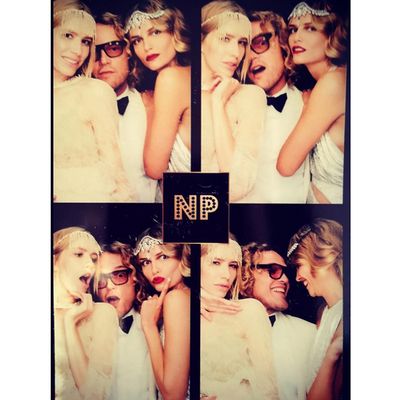 <p>Even supermodels have photo booths at their parties.</p>