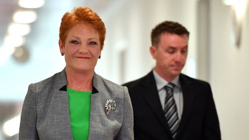 One Nation leader Senator Pauline Hanson and advisor James Ashby arrive at a press conference at Parliament House in Canberra. (AAP)