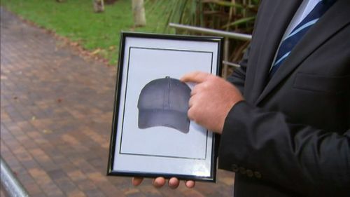 The attacker was wearing a hat similar to this artist's depiction. (9NEWS)