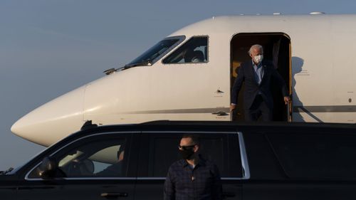 Joe Biden disembarking from a plane in his hometown of Wilmington, Delaware.