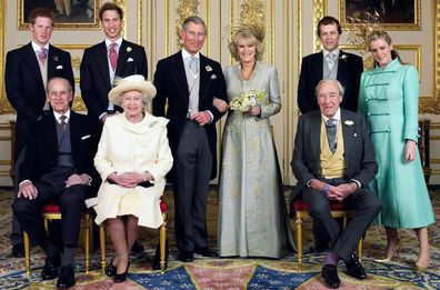 Prince Charles, the Prince of Wales and his new bride Camilla, Duchess of Cornwall, with their families, L-R back row: Prince Harry, Prince William, Tom and Laura Parker-Bowles, L-R front row: Prince Philip, Queen Elizabeth II and Camilla's father Major Bruce Shand, in the White Drawing Room at Windsor Castle.