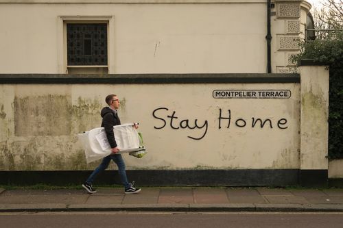 "Stay home" is graffitied on a wall in Brighton on March 17, 2020 in Brighton, England. Boris Johnson held the first of his public daily briefing on the Coronavirus outbreak yesterday and told the public to avoid theatres, going to the pub and work from home where possible. 