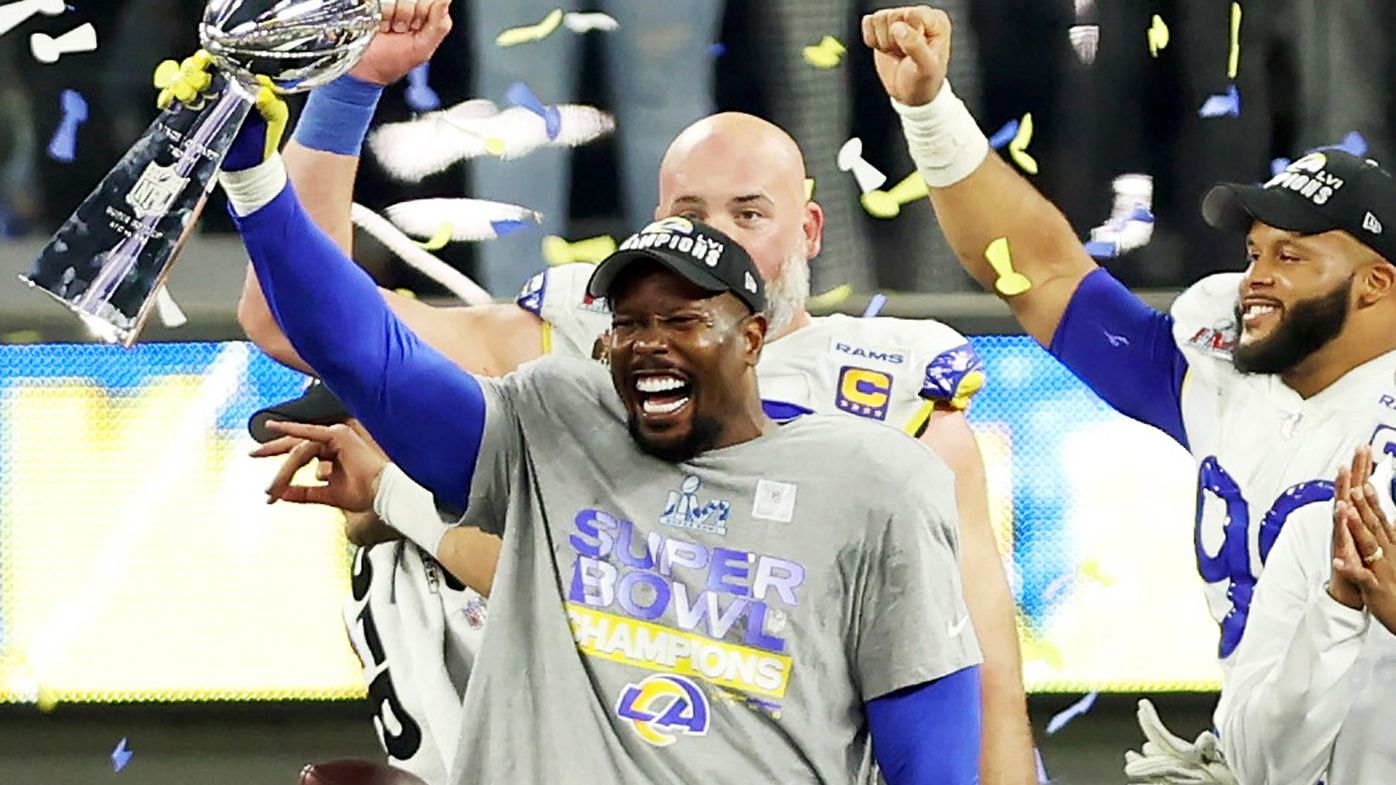 Von Miller #40 of the Los Angeles Rams holds up the Vince Lombardi Trophy after Super Bowl LVI at SoFi Stadium on February 13, 2022.