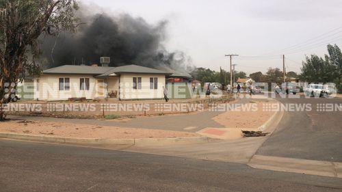 Neighbours were able to pull the children from the burning home.