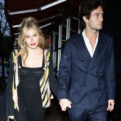 Sienna Miller (L) and Oli Green