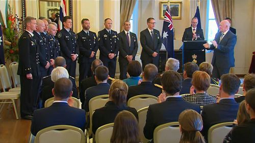 The rescuers were honoured at a ceremony at Government House today. Picture: 9NEWS