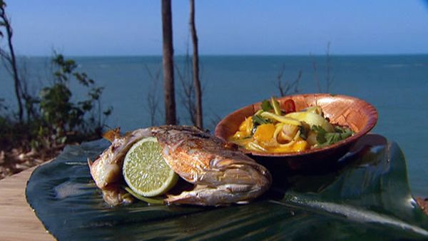 Barbecued whole snapper with green mango relish
