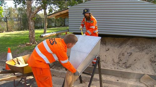 The SES were bagging up sandbags in Newcastle this afternoon. (9NEWS)
