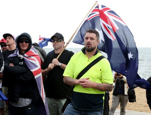 Some of the far-right protesters at Saturday's rally on St Kilda Beach in Melbourne. (AAP)