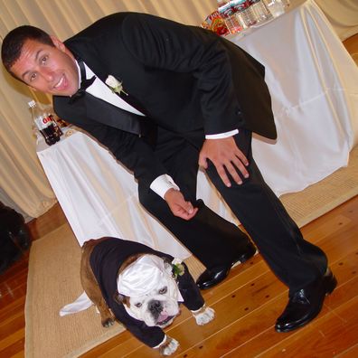 Adam Sandler poses with his bride model-actress Jackie Titone at their wedding June 22, 2003 in Malibu, California. 