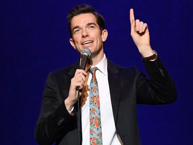 Comedian John Mulaney, performs, comedy gig, standup