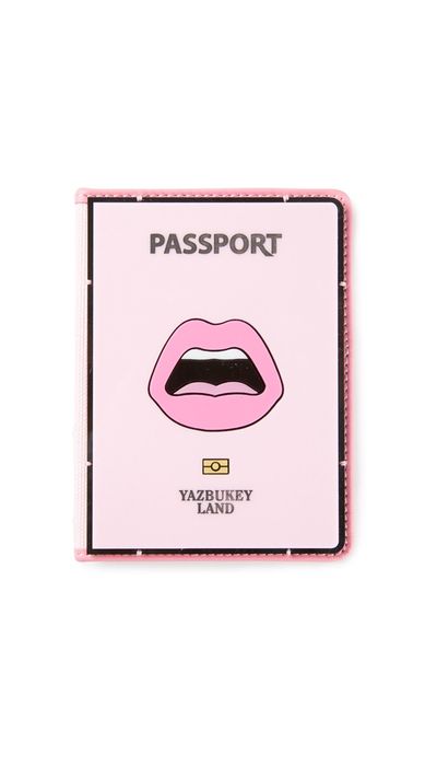 <a href="http://www.farfetch.com/au/shopping/women/yazbukey-cest-ahh-passport-case-item-10887220.aspx" target="_blank">C’est Ahh Passport Case, $229.70, Yazbukey</a>