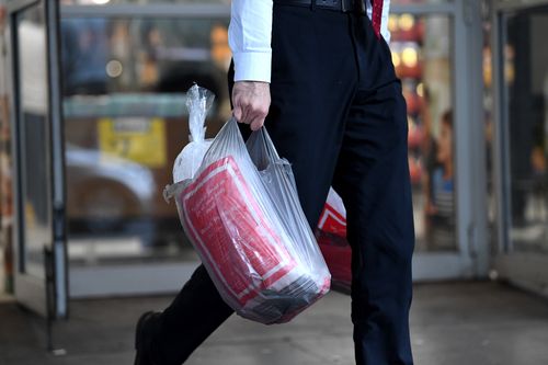 Woolworths is banning single-use plastic bags in 800 stores across Australia by June 20. (AAP)