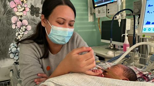 A baby's first Christmas is special for any parents.But today will be a particularly memorable occasion for ﻿Johnny and Josephina Li, both 29, from Sydney's west.
Their beloved baby Julian will be home with them after spending an incredible 197 days in hospital.